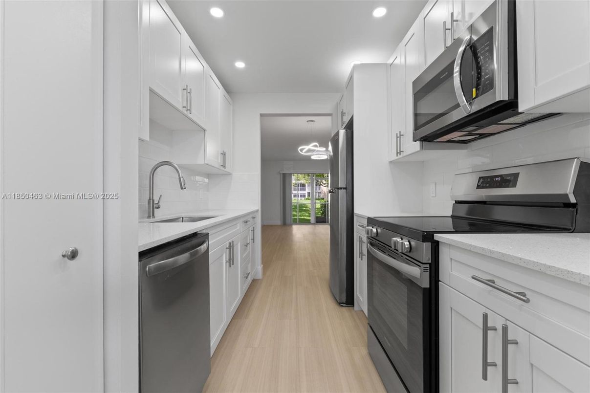 Interior, Kitchen, Recessed Lighting, Stainless Steel Appliances, Wood Texture Flooring