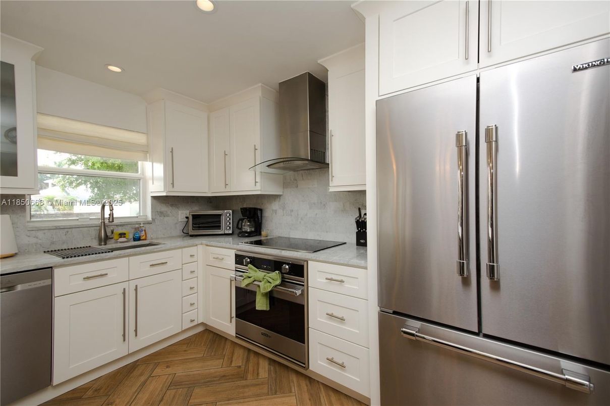Interior, Kitchen, Recessed Lighting, Stainless Steel Appliances, Wood Texture Flooring