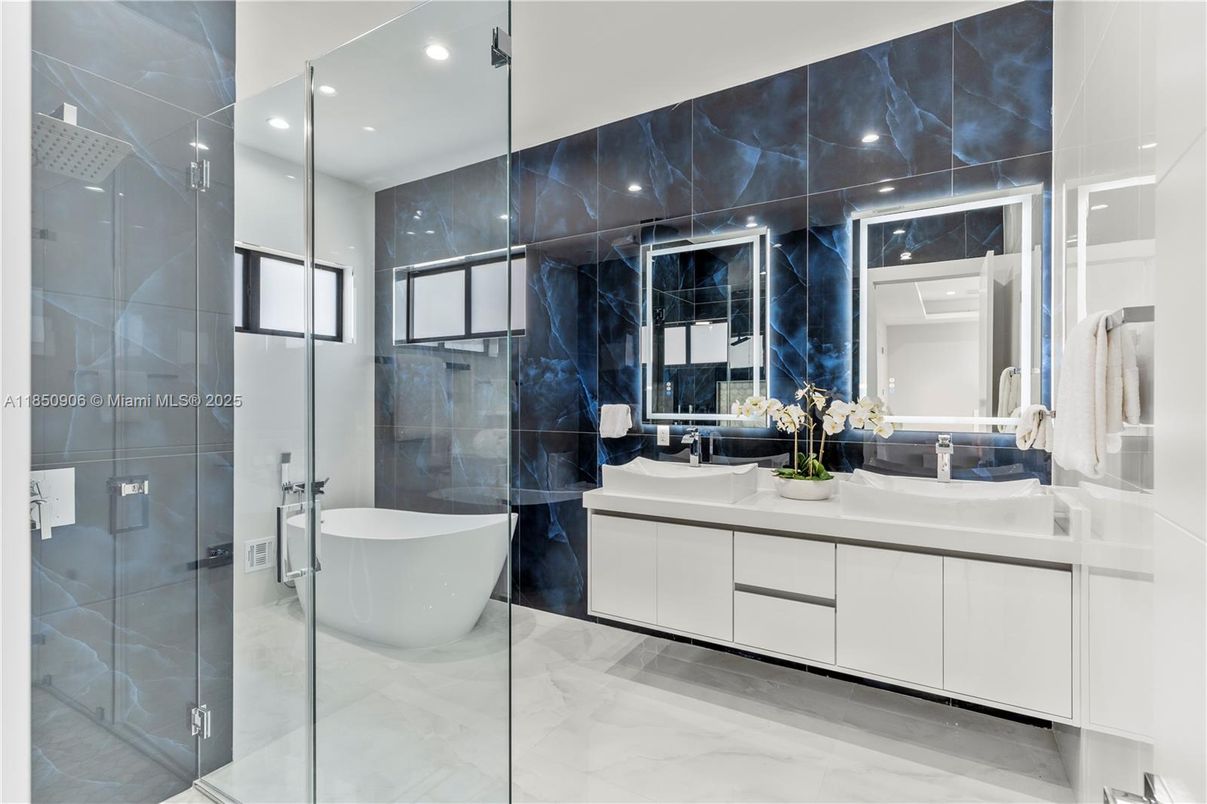 Bathroom, Dual Sink Vanities, Free Standing Baths, Glass Shower, Interior, Marble, Marble Walls, Recessed Lighting