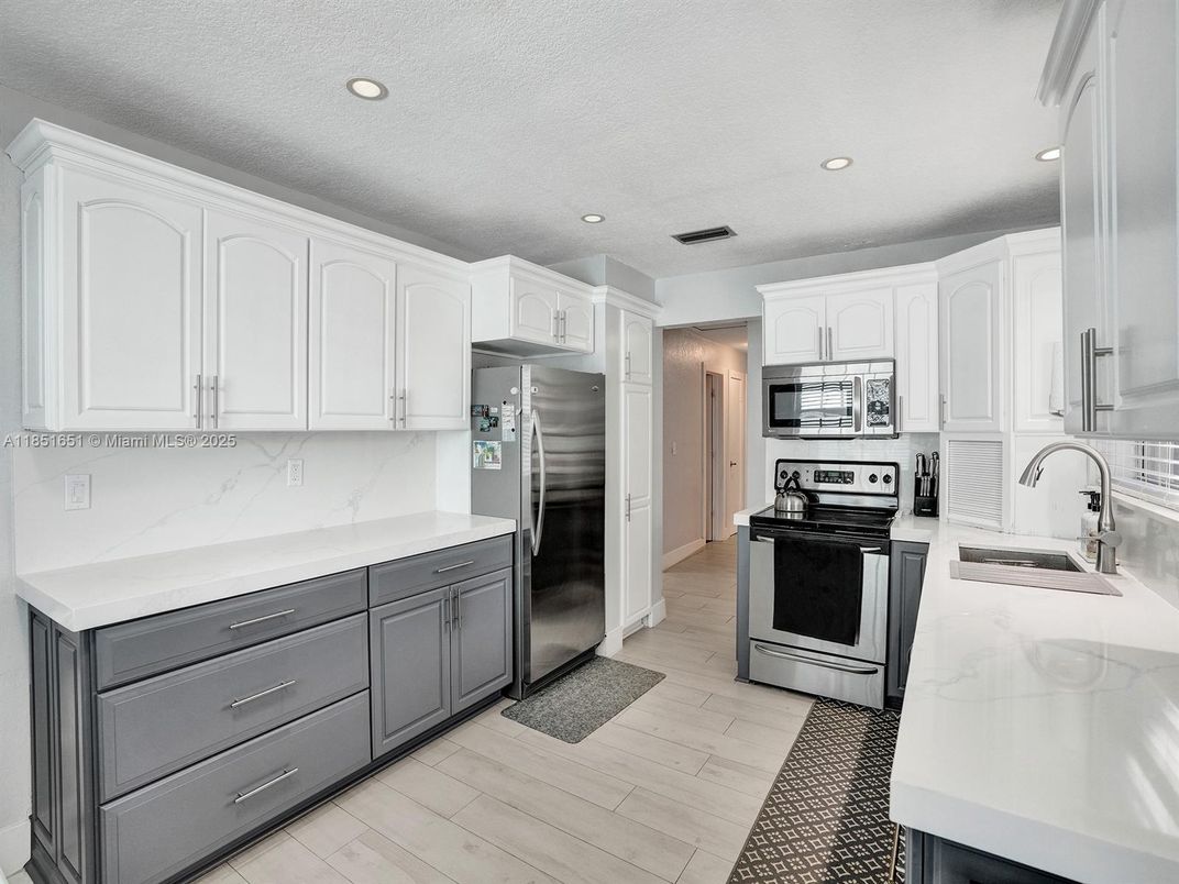 Interior, Kitchen, Recessed Lighting, Stainless Steel Appliances, Wood Texture Flooring