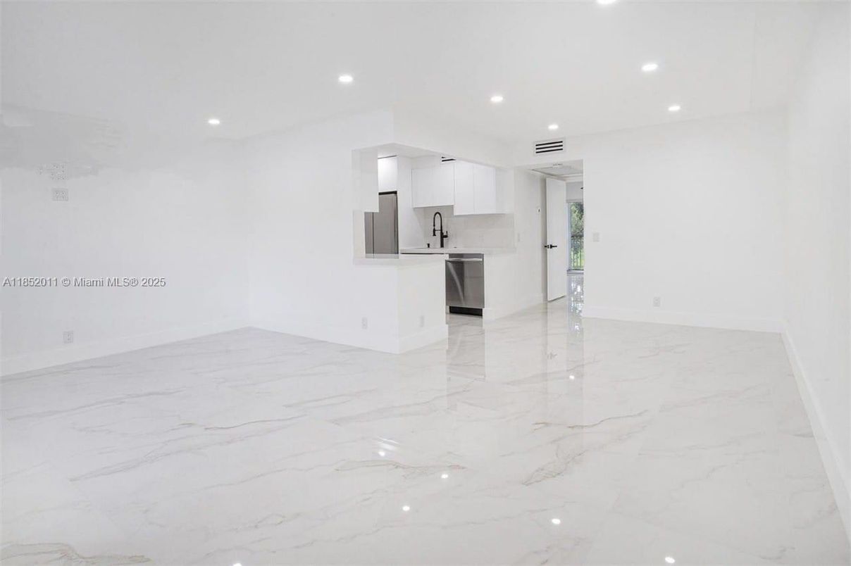 Empty room, Interior, Kitchen, Marble, Recessed Lighting, Stainless Steel Appliances