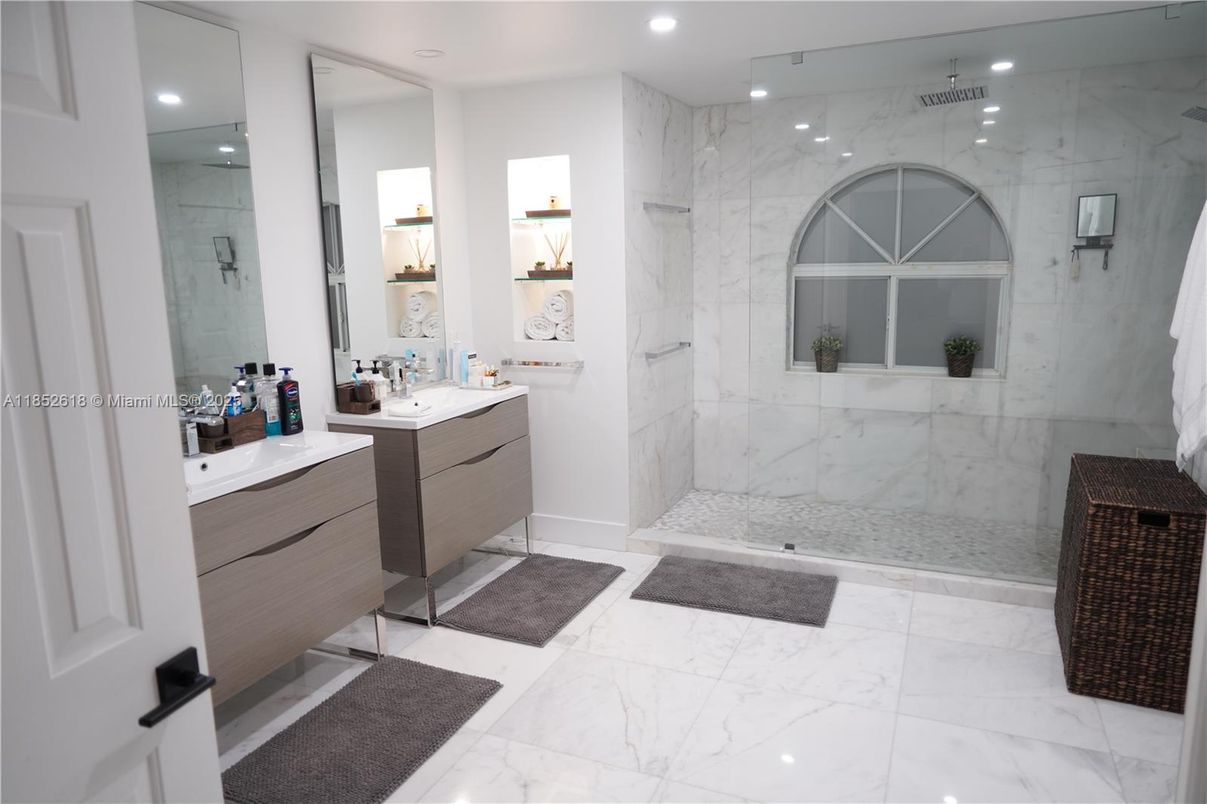Bathroom, Dual Sink Vanities, Glass Shower, Interior, Marble, Marble Walls, Recessed Lighting
