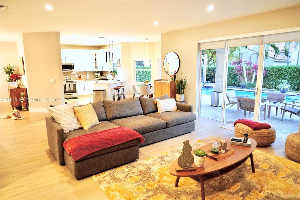 Dining room, Interior, Kitchen, Living room, Pendant Lights, Recessed Lighting, Stainless Steel Appliances, Wood Texture Flooring