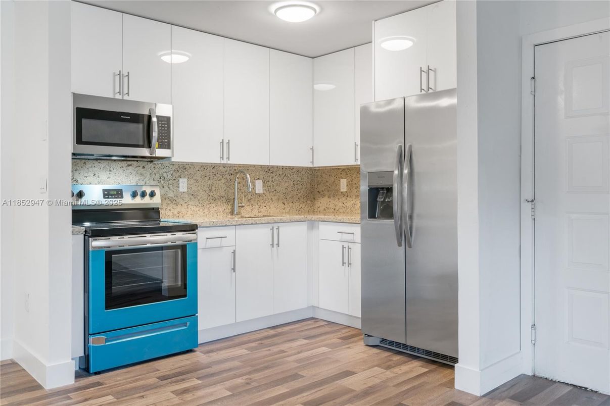 Interior, Kitchen, Recessed Lighting, Stainless Steel Appliances, Wood Texture Flooring