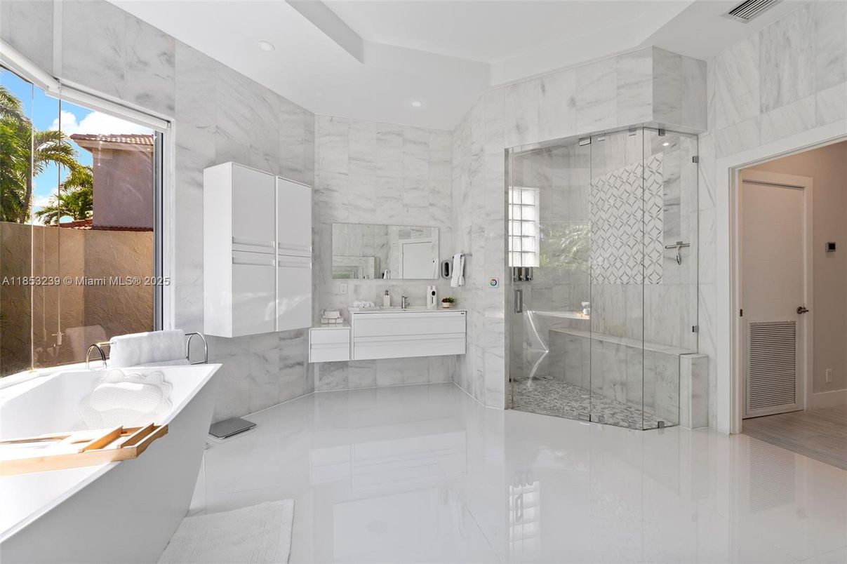 Bathroom, Dual Sink Vanities, Glass Shower, Interior, Marble Walls, Recessed Lighting