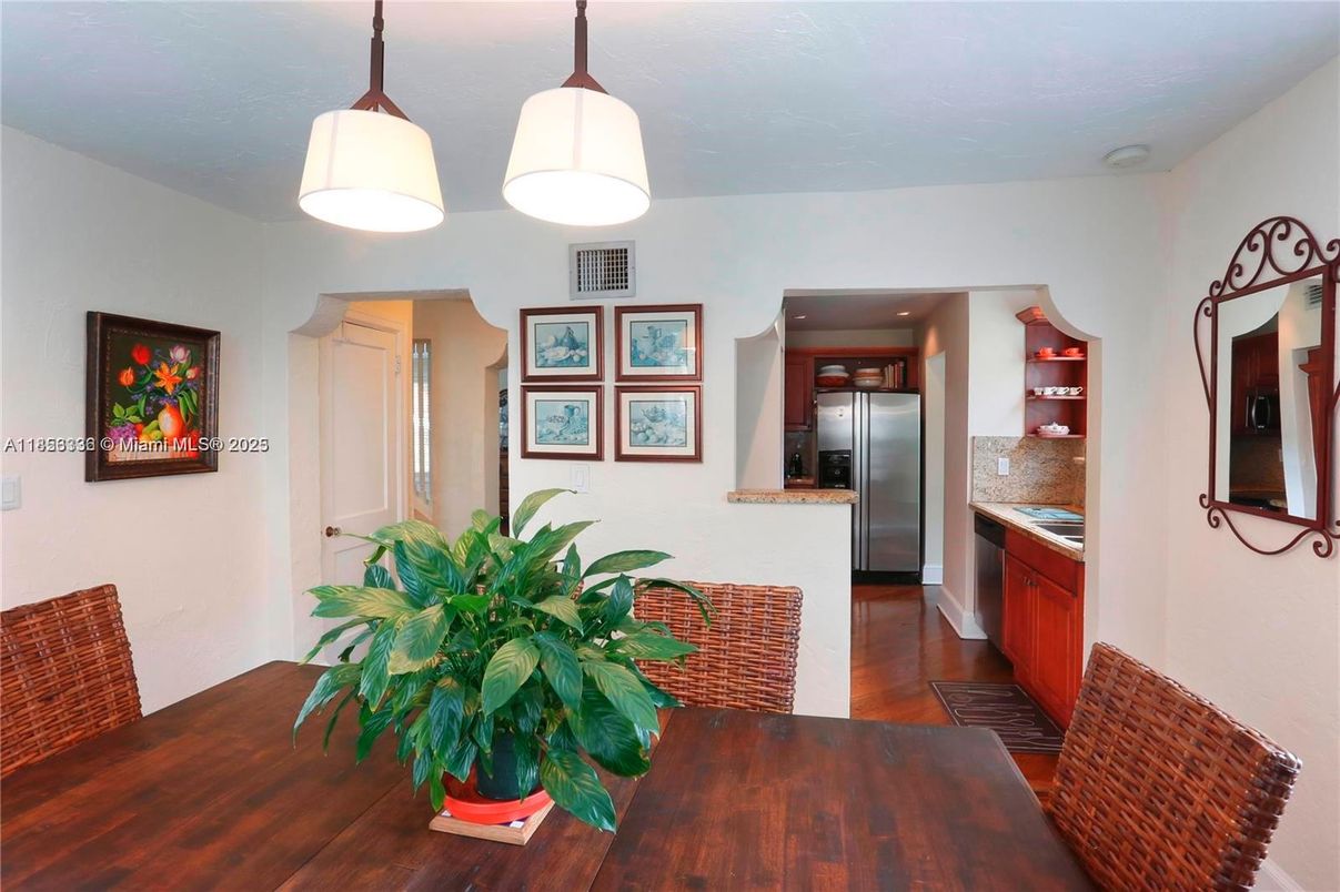 Dining room, Interior, Kitchen, Pendant Lights, Recessed Lighting, Stainless Steel Appliances, Wood Texture Flooring