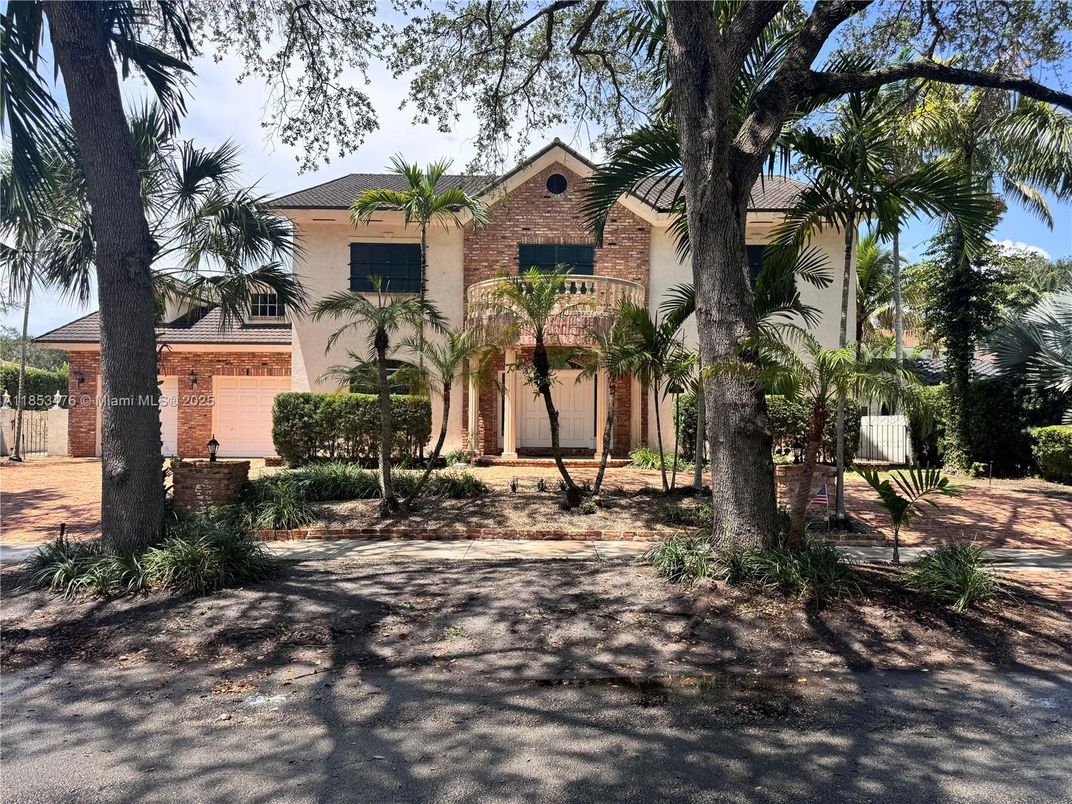 Attached, Exterior, Facade, Brick Facade, Spanish Mediterranean