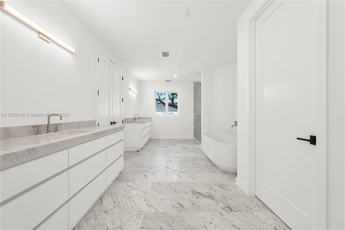 Bathroom, Dual Sink Vanities, Free Standing Baths, Interior, Marble, Recessed Lighting