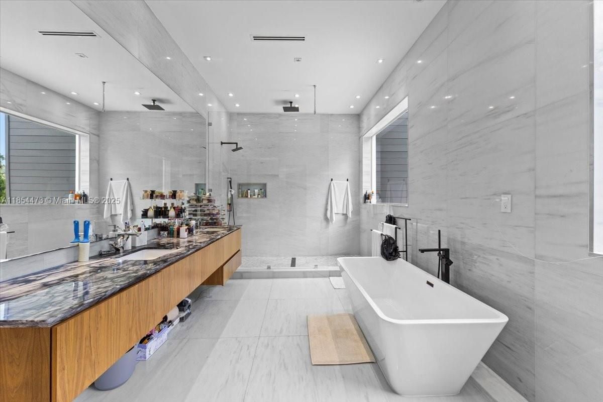 Bathroom, Dual Sink Vanities, Free Standing Baths, Glass Shower, Interior, Marble, Marble Walls, Recessed Lighting