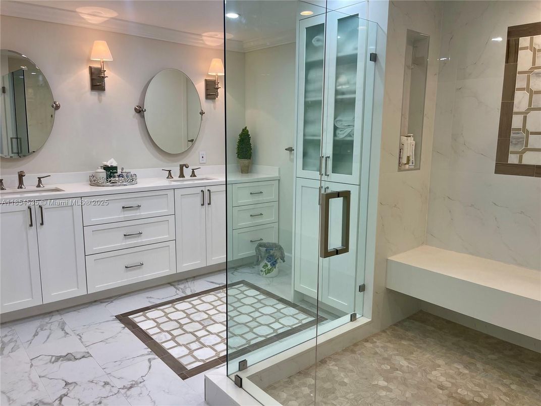 Bathroom, Dual Sink Vanities, Glass Shower, Interior, Marble, Marble Walls, Recessed Lighting