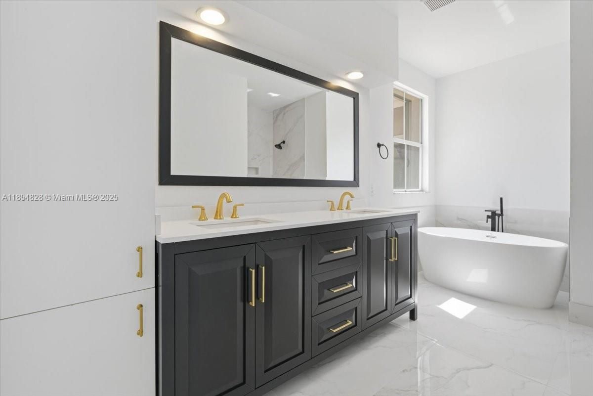 Bathroom, Dual Sink Vanities, Free Standing Baths, Interior, Marble, Recessed Lighting