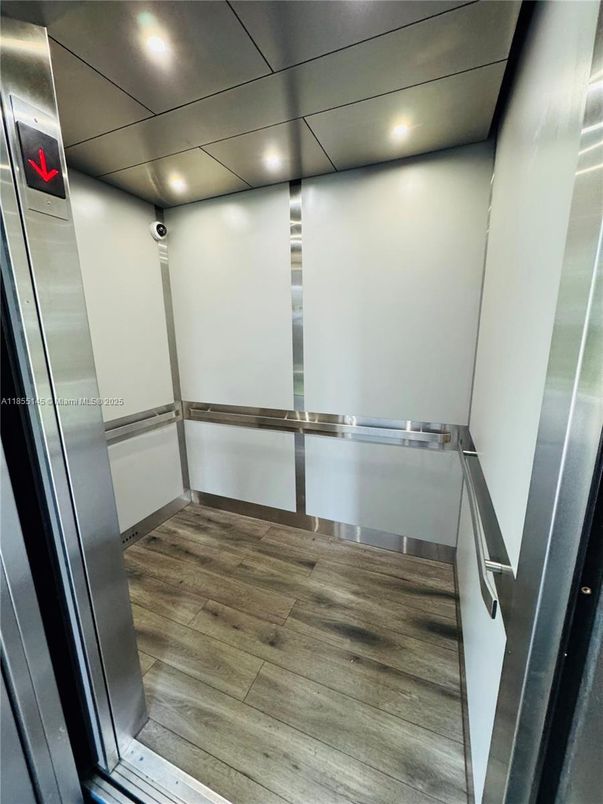 Elevator, Interior, Recessed Lighting, Wood Texture Flooring