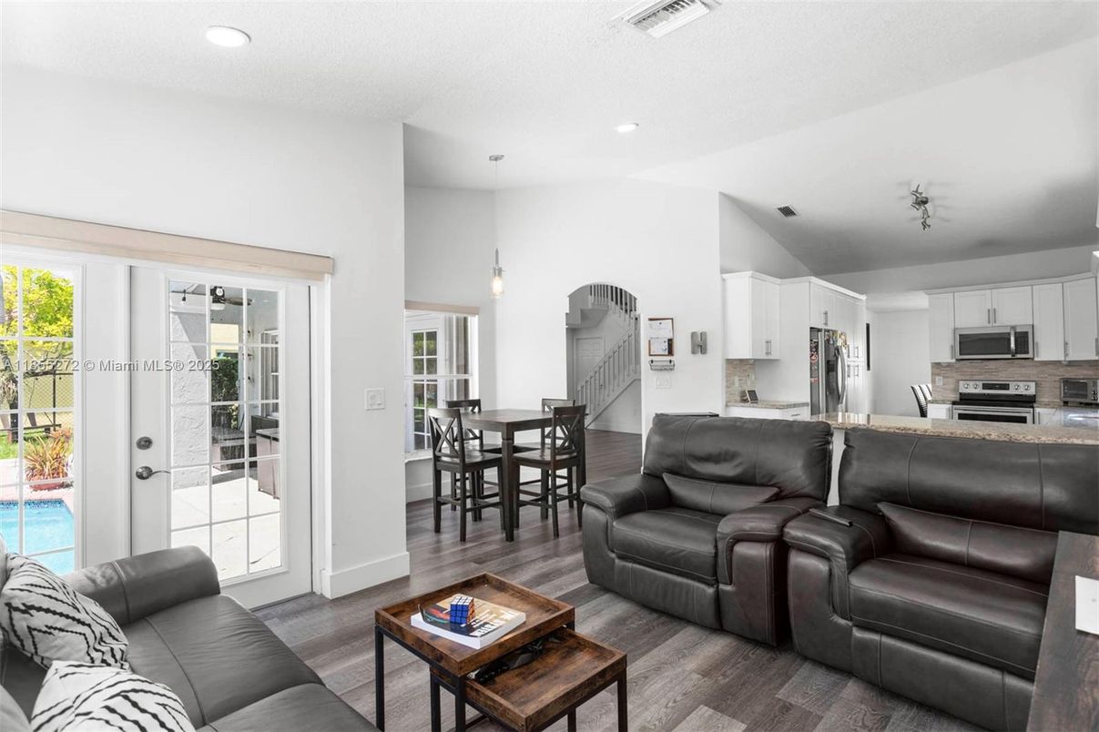 Dining room, Interior, Kitchen, Living room, Pendant Lights, Recessed Lighting, Stainless Steel Appliances, Wood Texture Flooring