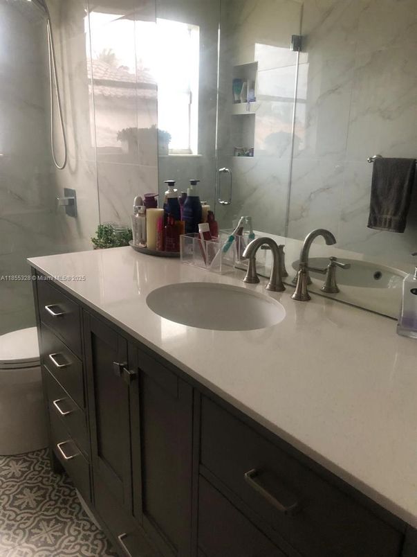 Bathroom, Dual Sink Vanities, Glass Shower, Interior, Marble Walls