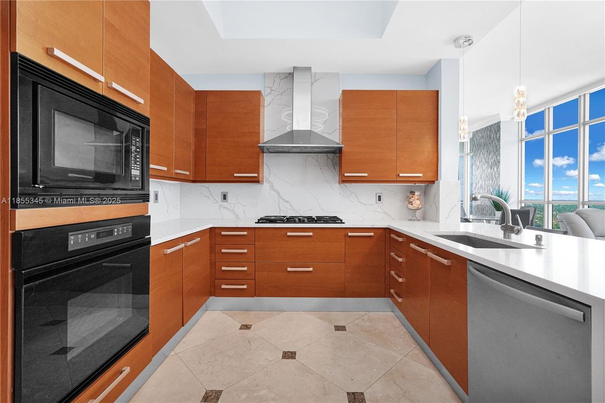 Interior, Kitchen, Marble Walls, Pendant Lights, Stainless Steel Appliances
