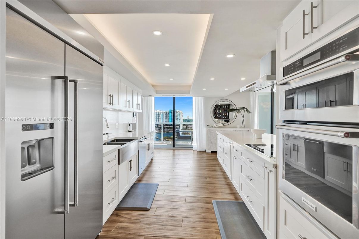Interior, Kitchen, Recessed Lighting, Stainless Steel Appliances, Wood Texture Flooring
