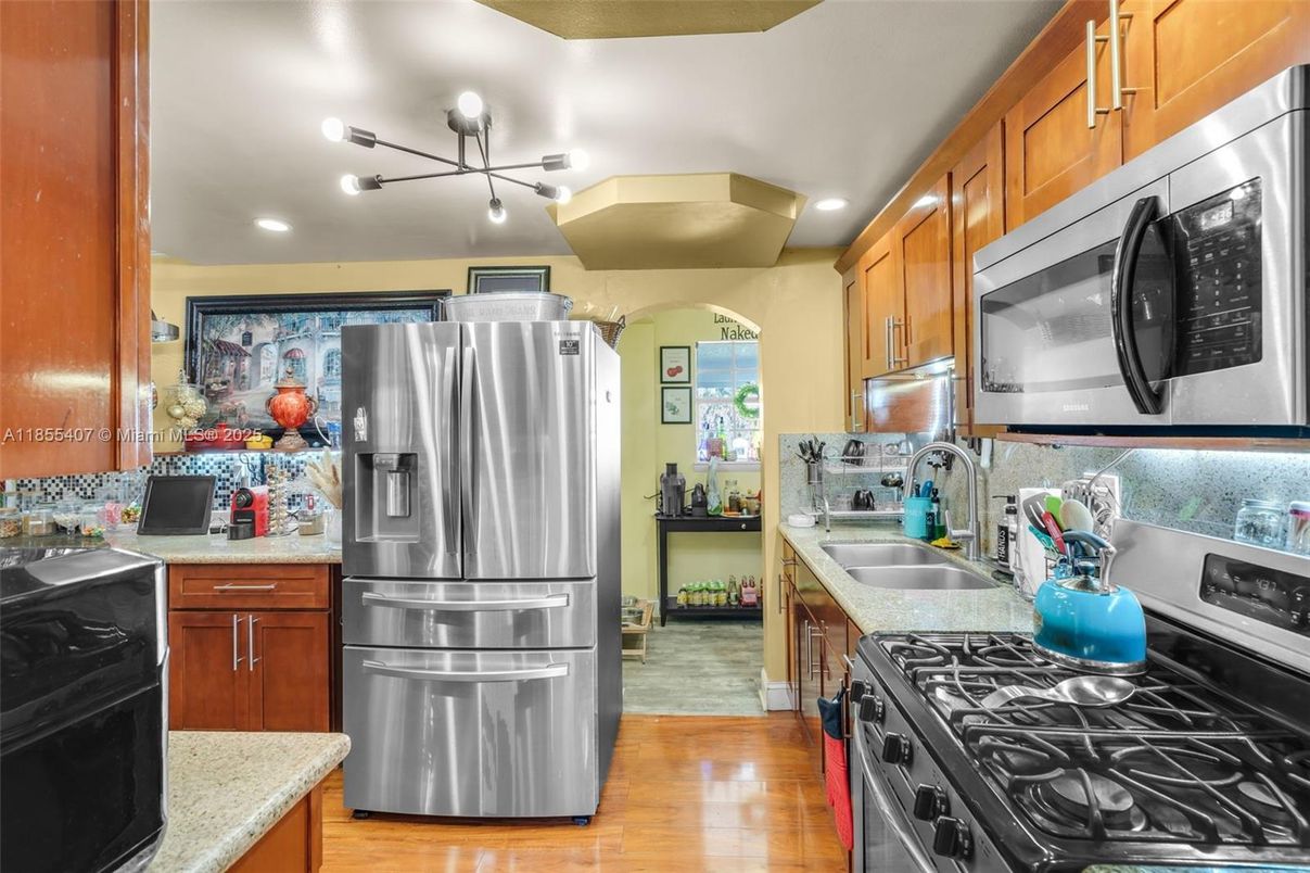 Interior, Kitchen, Pendant Lights, Recessed Lighting, Stainless Steel Appliances, Wood Texture Flooring