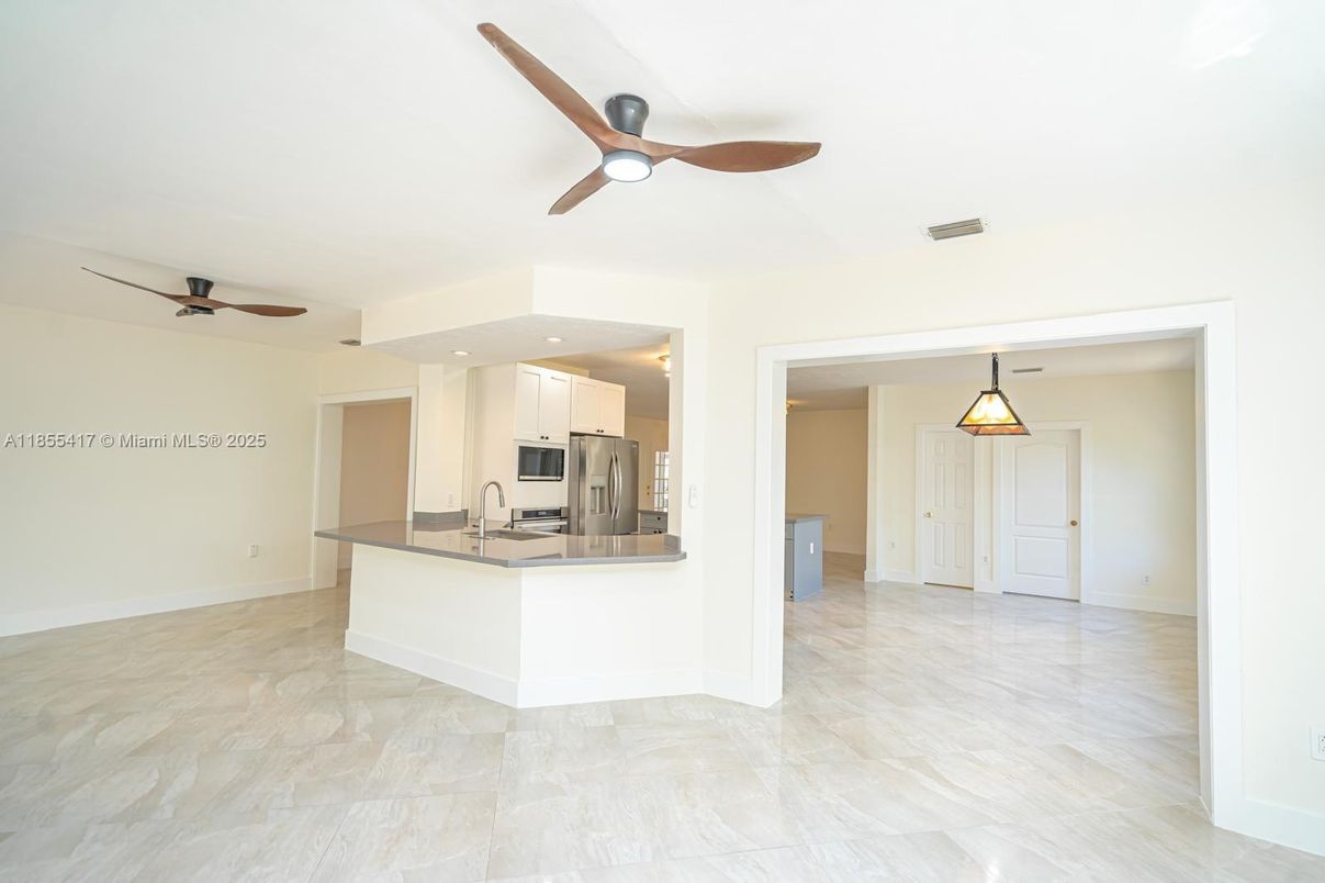 Empty room, Interior, Kitchen, Pendant Lights, Recessed Lighting, Stainless Steel Appliances