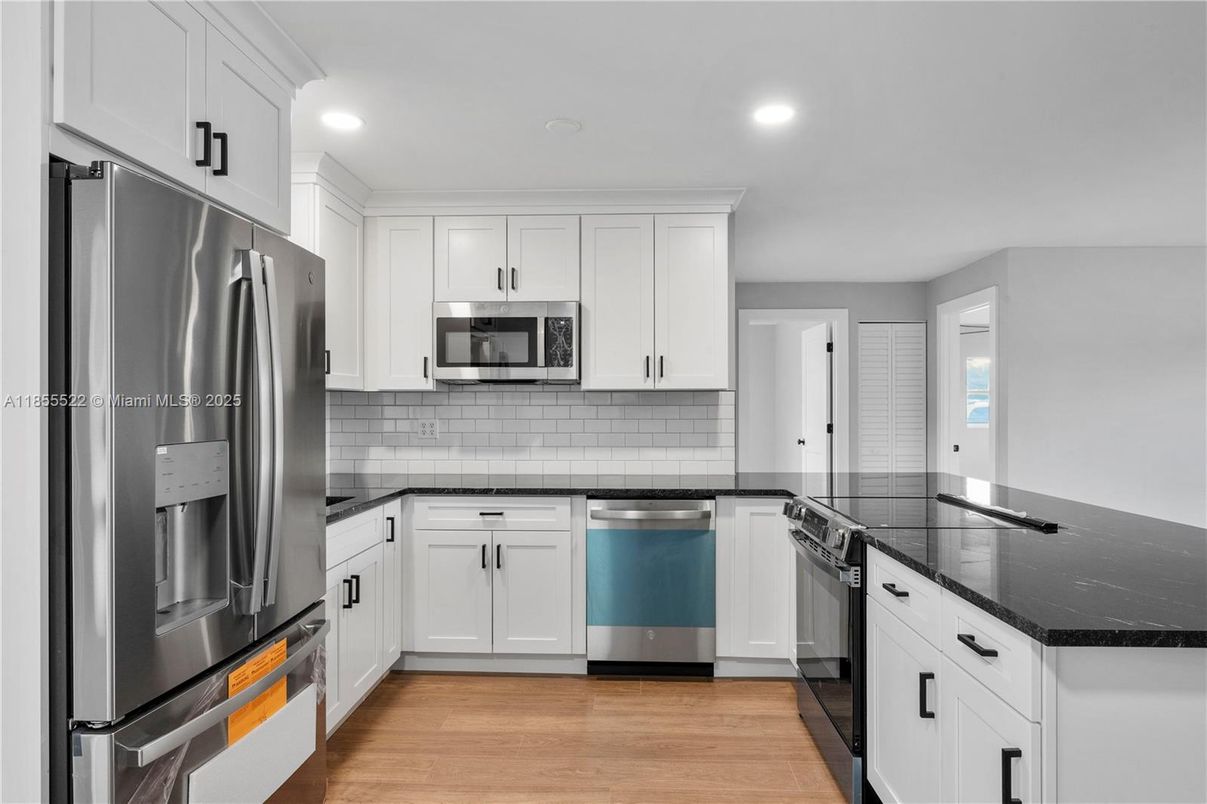 Interior, Kitchen, Recessed Lighting, Stainless Steel Appliances, Wood Texture Flooring