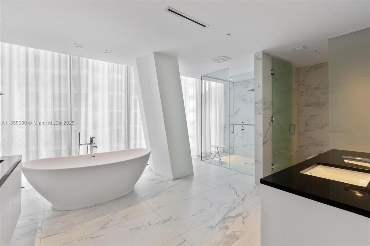 Bathroom, Free Standing Baths, Glass Shower, Interior, Marble, Marble Walls, Recessed Lighting