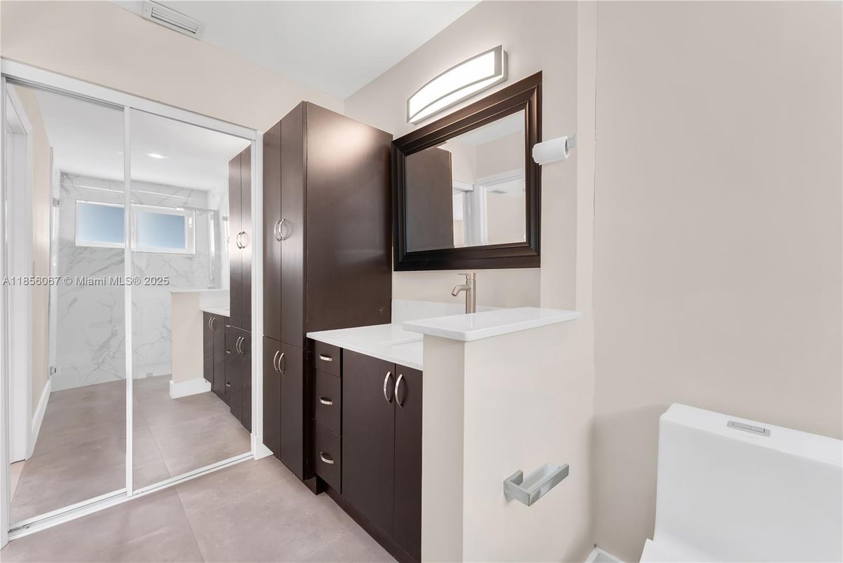 Bathroom, Dual Sink Vanities, Glass Shower, Interior, Marble Walls