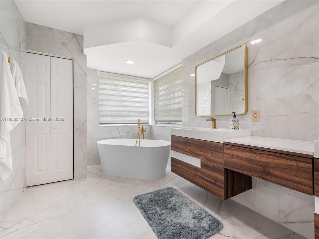 Bathroom, Dual Sink Vanities, Free Standing Baths, Interior, Marble, Marble Walls, Recessed Lighting