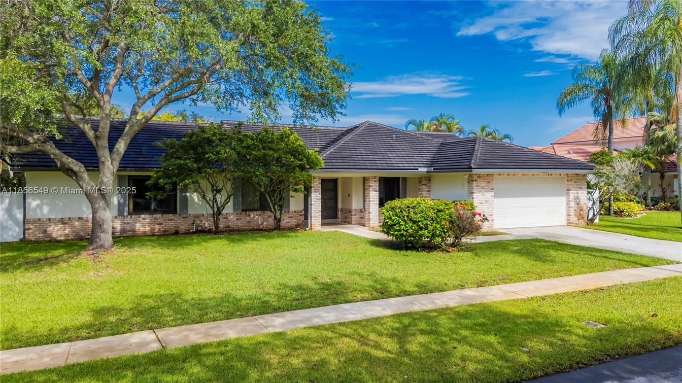 Attached, Backyard, Exterior, Facade, Brick Facade, Ranch