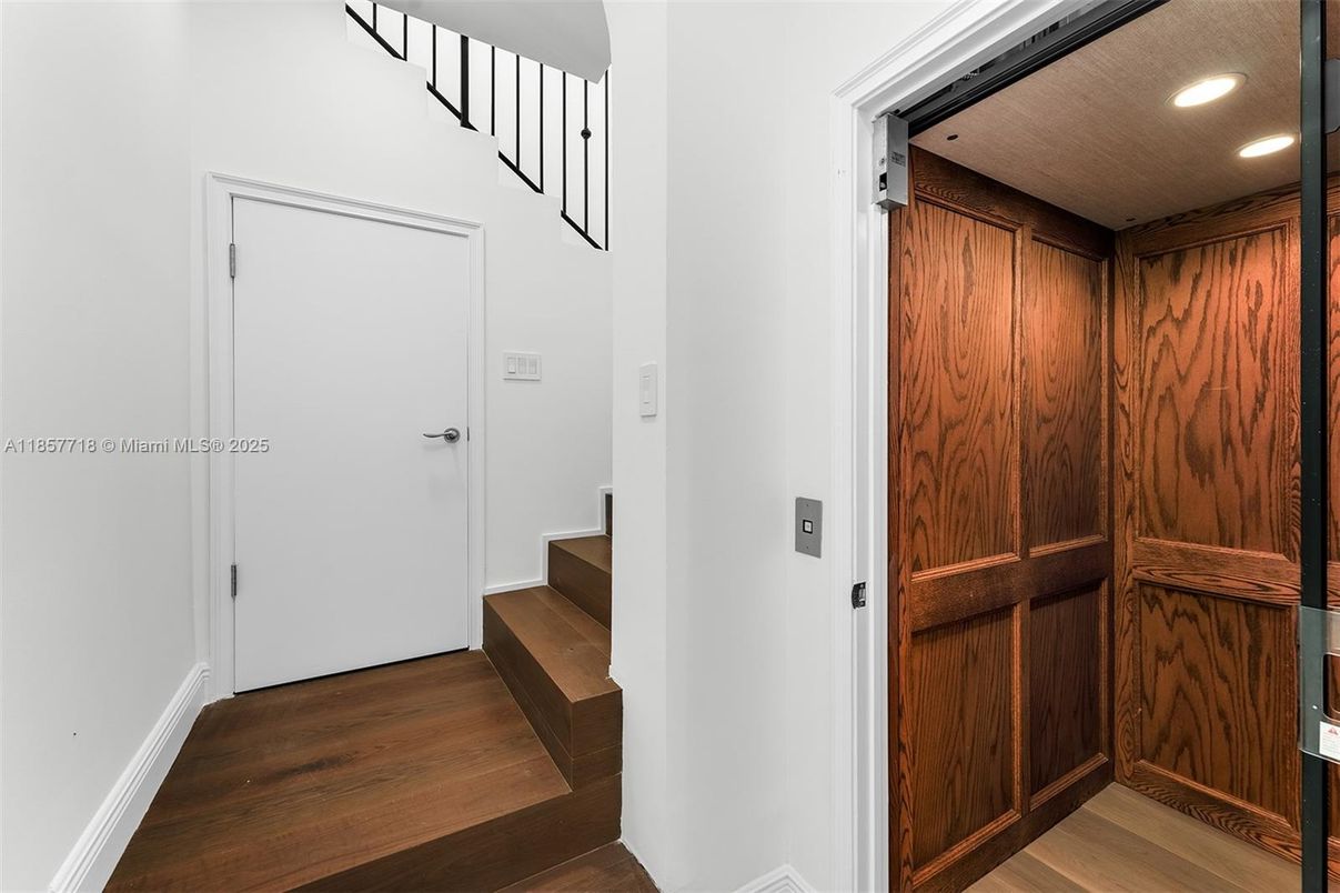 Elevator, Interior, Recessed Lighting, Wood Texture Flooring, Wooden Walls