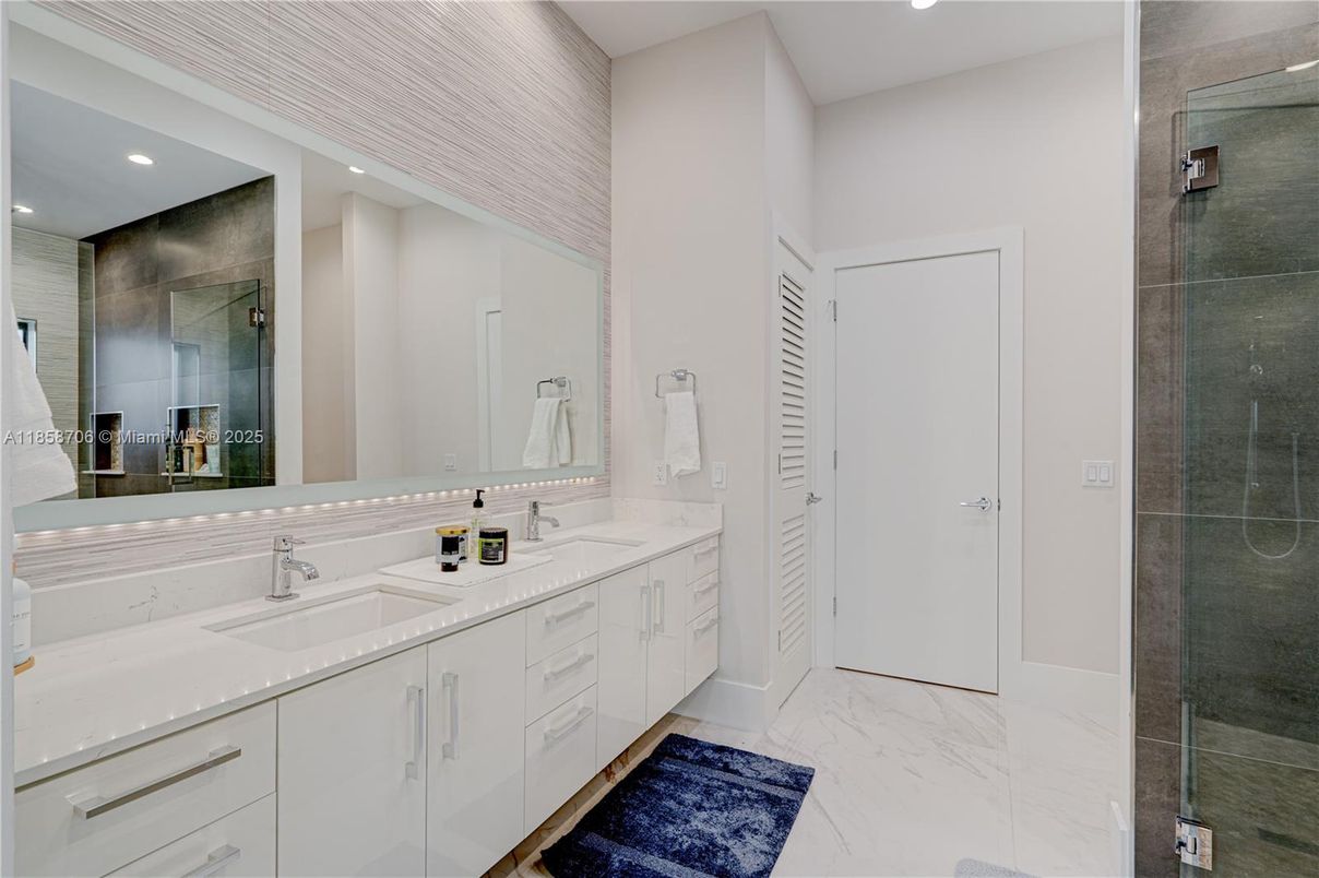 Bathroom, Dual Sink Vanities, Glass Shower, Interior, Marble, Recessed Lighting