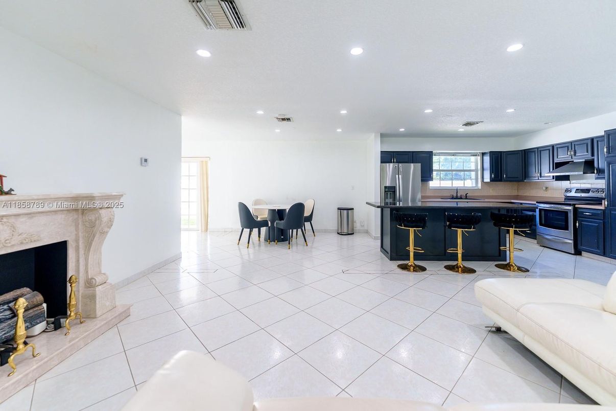 Dining room, Fireplace, Interior, Kitchen, Recessed Lighting, Stainless Steel Appliances