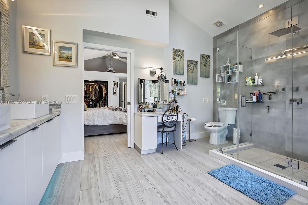 Bathroom, Bedroom, Glass Shower, Interior, Recessed Lighting, Wood Texture Flooring