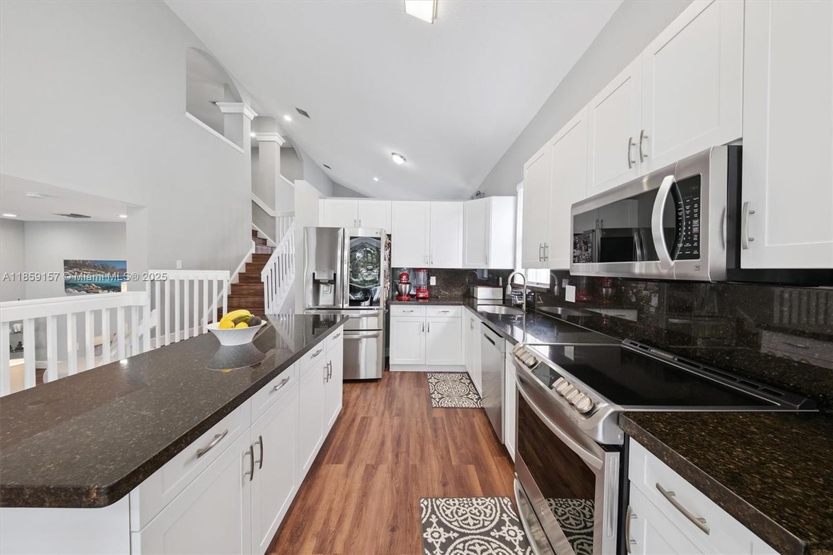 Interior, Kitchen, Recessed Lighting, Stainless Steel Appliances, Wood Texture Flooring