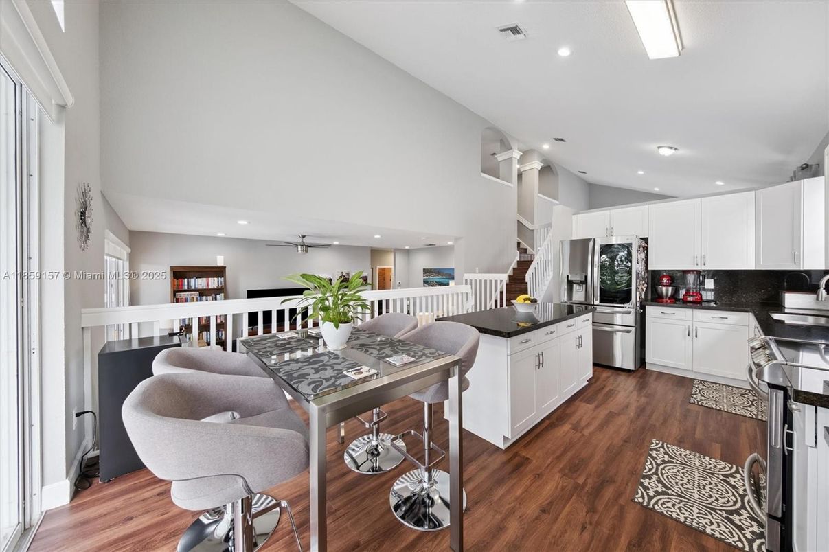 Dining room, Interior, Kitchen, Recessed Lighting, Stainless Steel Appliances, Wood Texture Flooring