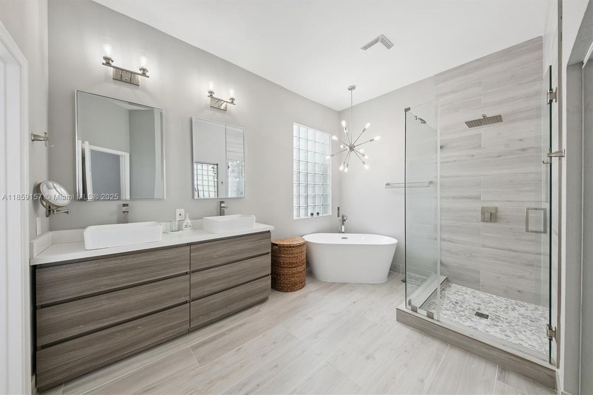 Bathroom, Dual Sink Vanities, Free Standing Baths, Glass Shower, Interior, Pendant Lights, Wood Texture Flooring