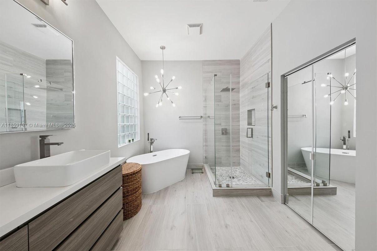 Bathroom, Dual Sink Vanities, Free Standing Baths, Glass Shower, Interior, Pendant Lights, Wood Texture Flooring