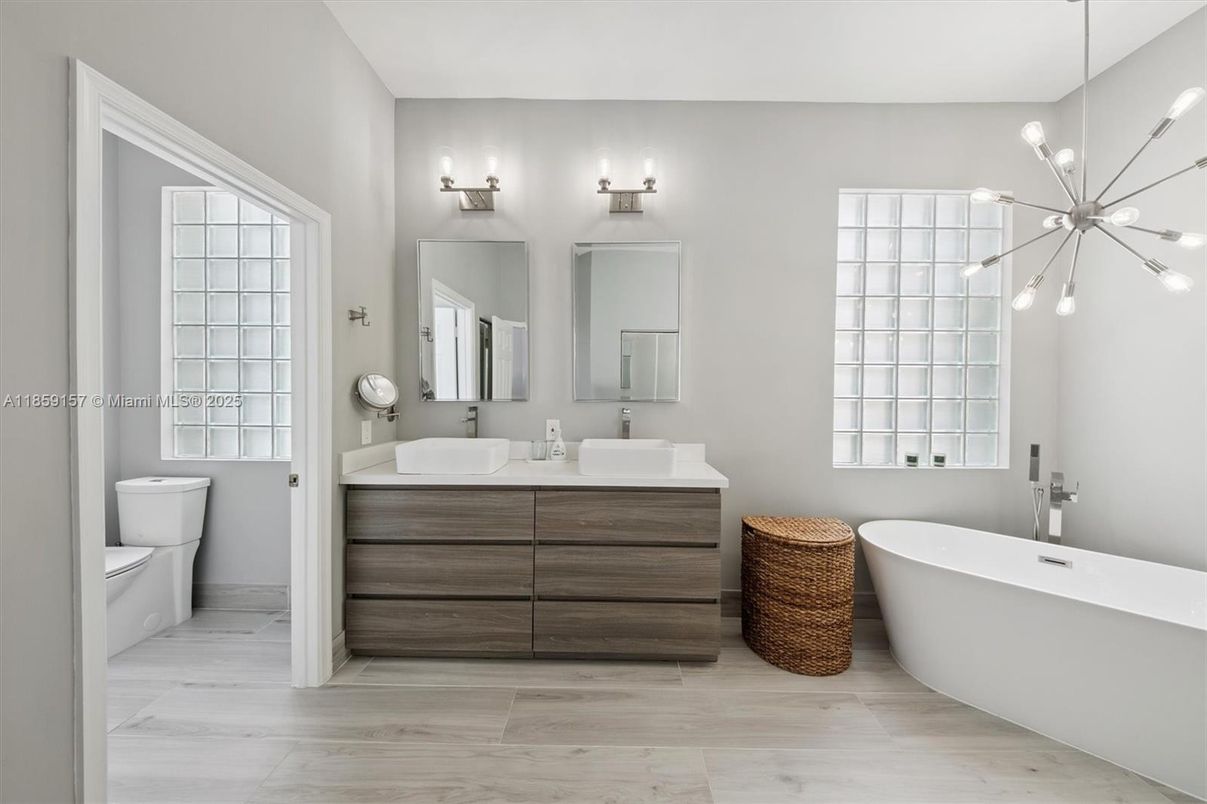Bathroom, Dual Sink Vanities, Free Standing Baths, Interior, Pendant Lights, Wood Texture Flooring