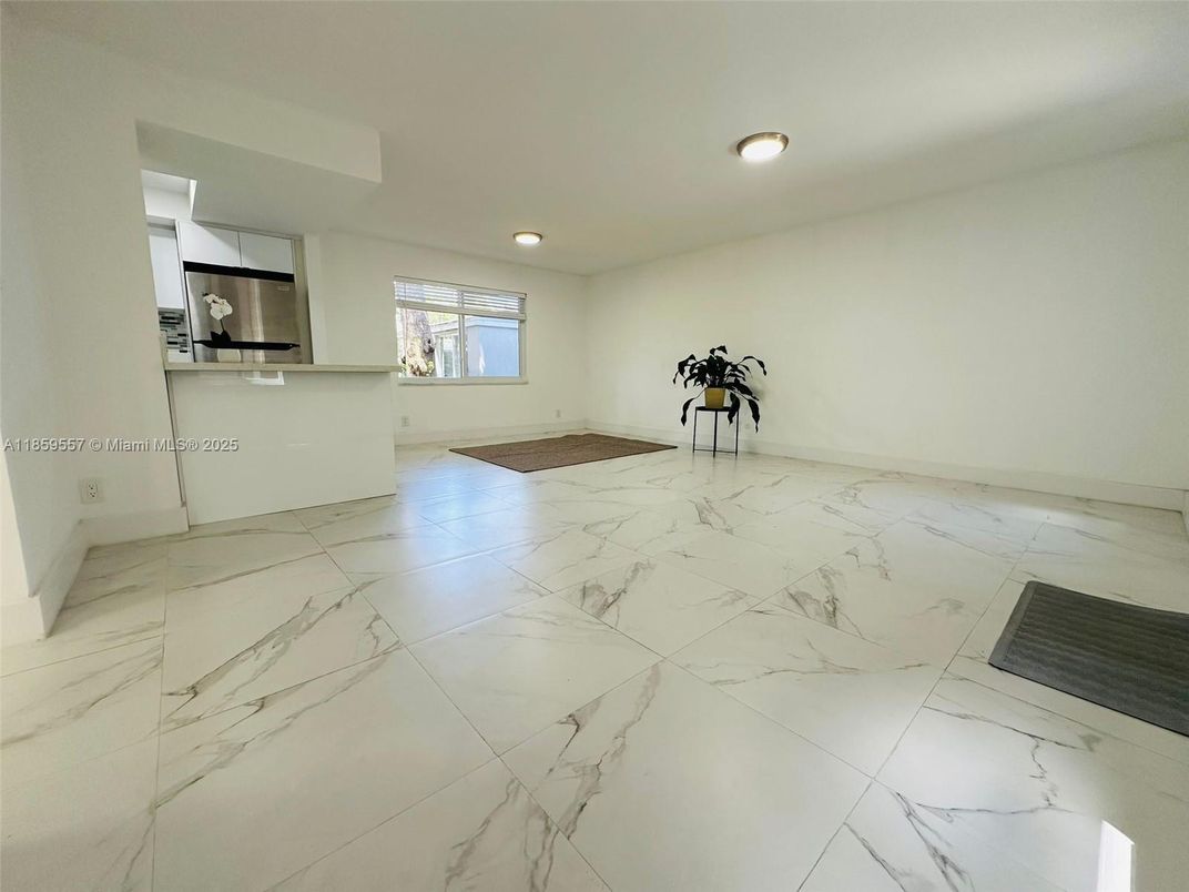 Empty room, Interior, Kitchen, Marble, Recessed Lighting, Stainless Steel Appliances