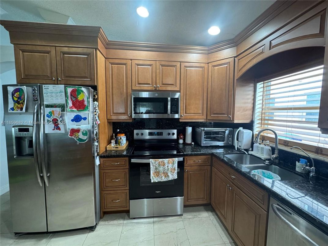 Interior, Kitchen, Recessed Lighting, Stainless Steel Appliances, Tile Countertops