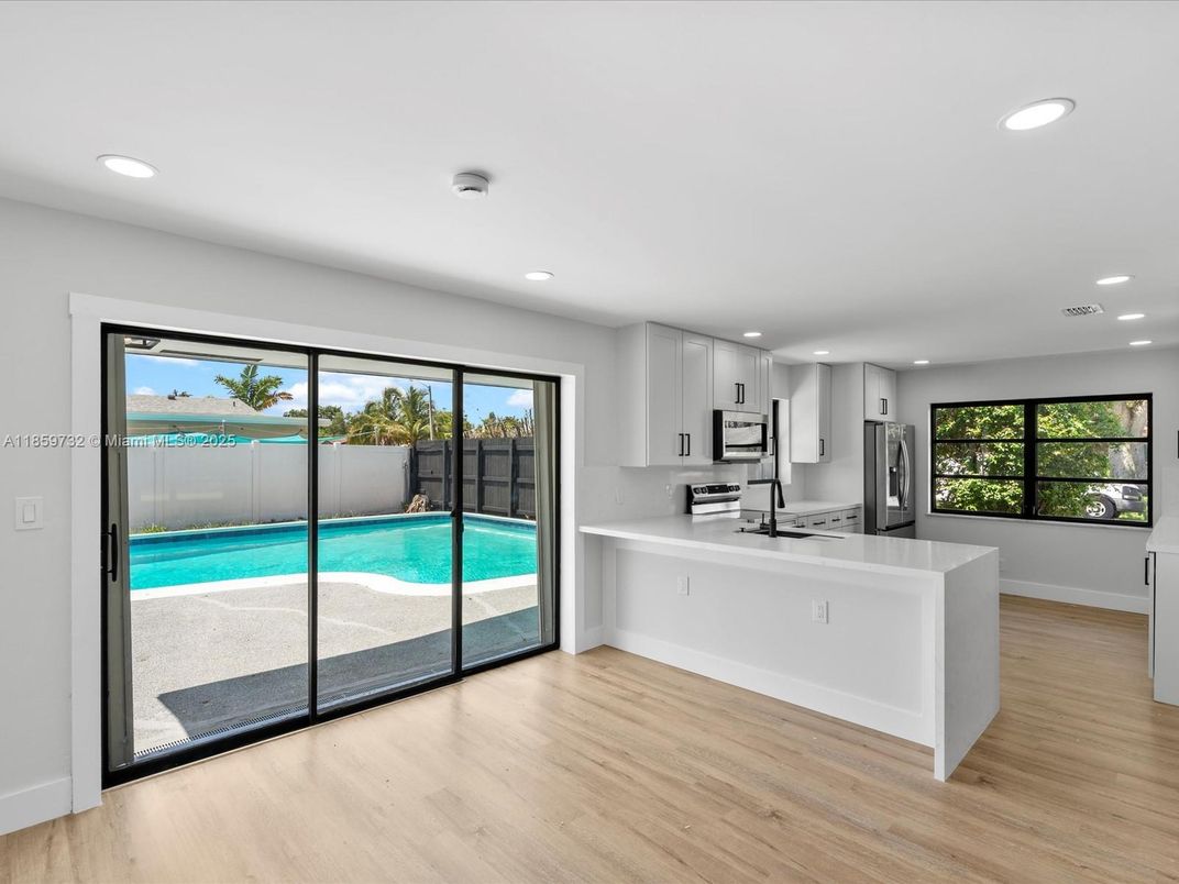 Interior, Kitchen, Recessed Lighting, Stainless Steel Appliances, Wood Texture Flooring