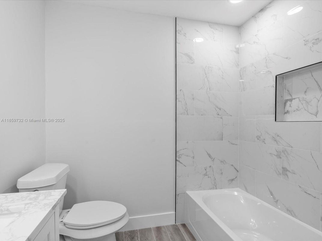 Bathroom, Interior, Marble Walls, Recessed Lighting, Wood Texture Flooring