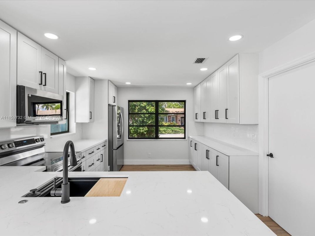 Interior, Kitchen, Recessed Lighting, Stainless Steel Appliances, Wood Texture Flooring