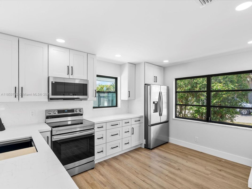 Interior, Kitchen, Recessed Lighting, Stainless Steel Appliances, Wood Texture Flooring