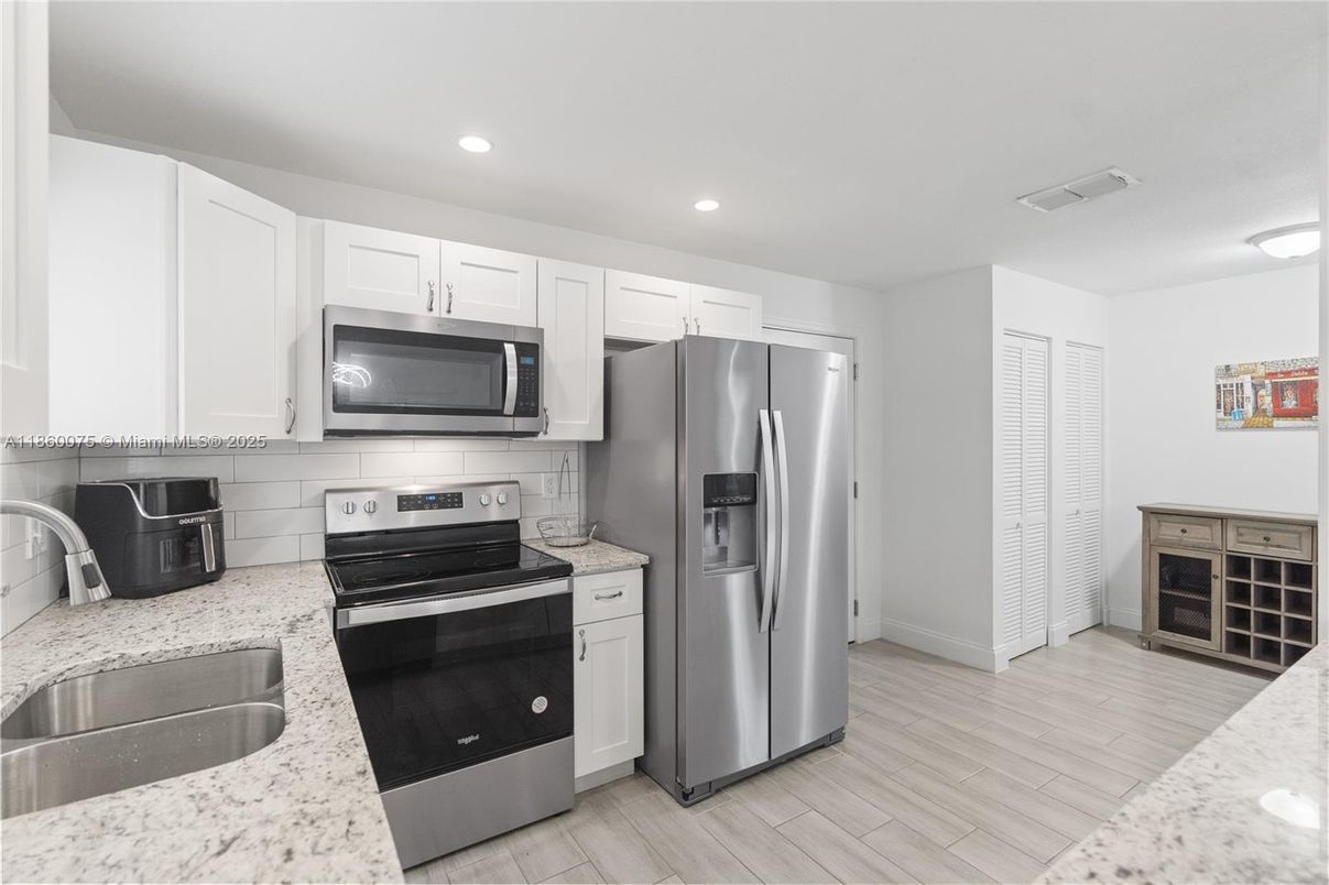 Interior, Kitchen, Recessed Lighting, Stainless Steel Appliances, Wood Texture Flooring