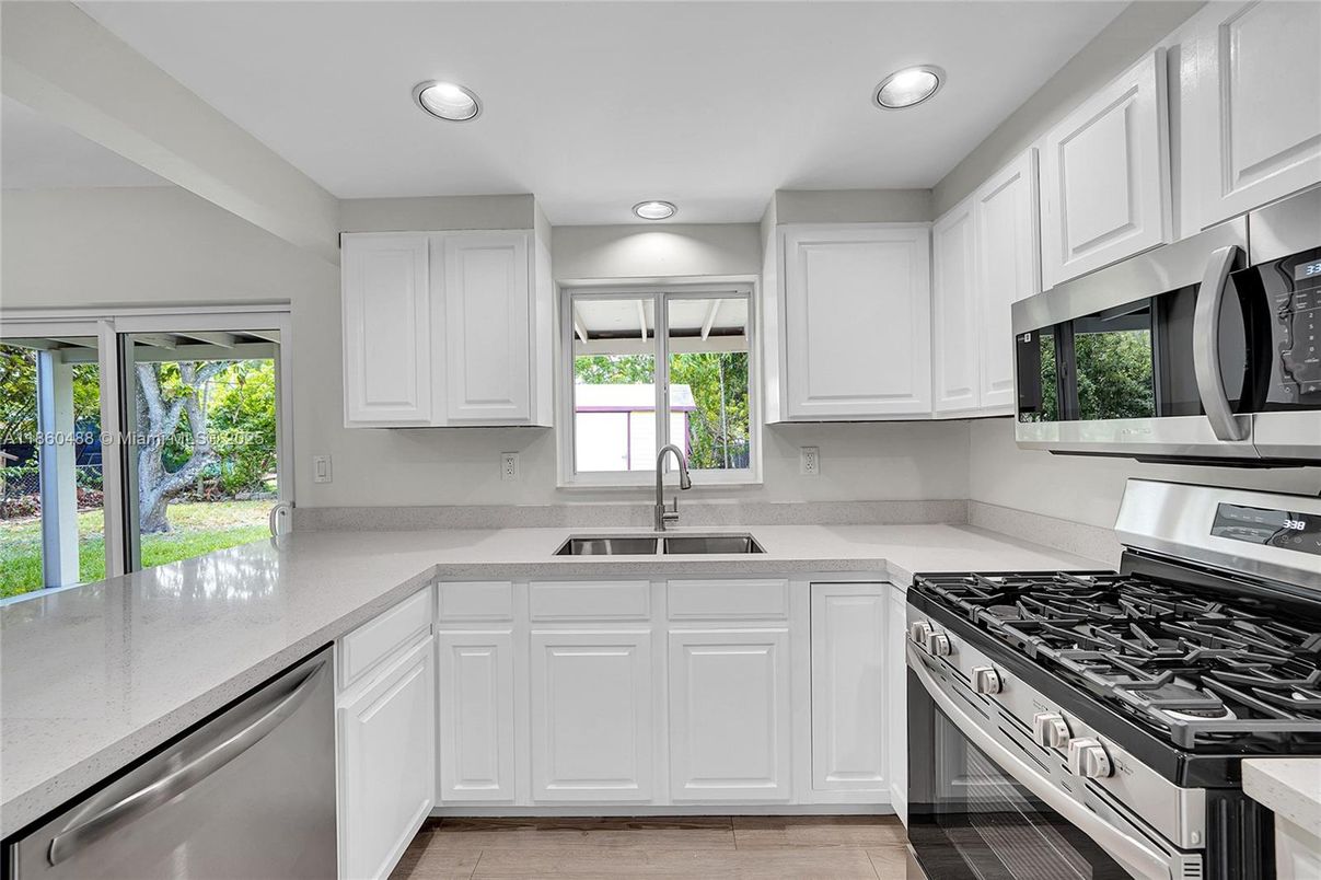 Interior, Kitchen, Recessed Lighting, Stainless Steel Appliances, Wood Texture Flooring