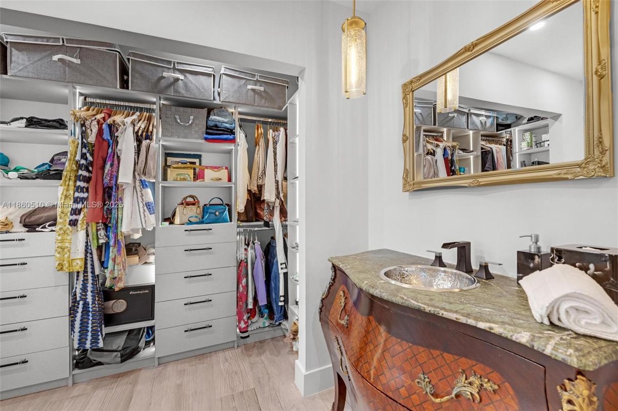 Bathroom, Dual Sink Vanities, Interior, Pendant Lights, Walk-in Closets, Wood Texture Flooring