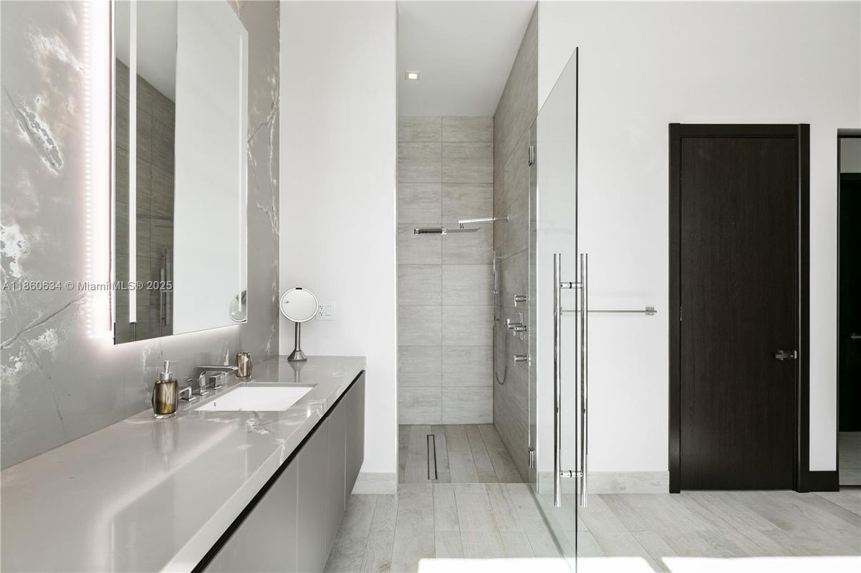Bathroom, Dual Sink Vanities, Glass Shower, Interior, Recessed Lighting, Wood Texture Flooring