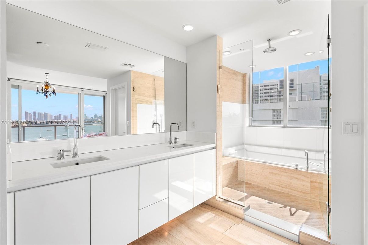 Bathroom, Dual Sink Vanities, Glass Shower, Interior, Recessed Lighting, Water, Wood Texture Flooring