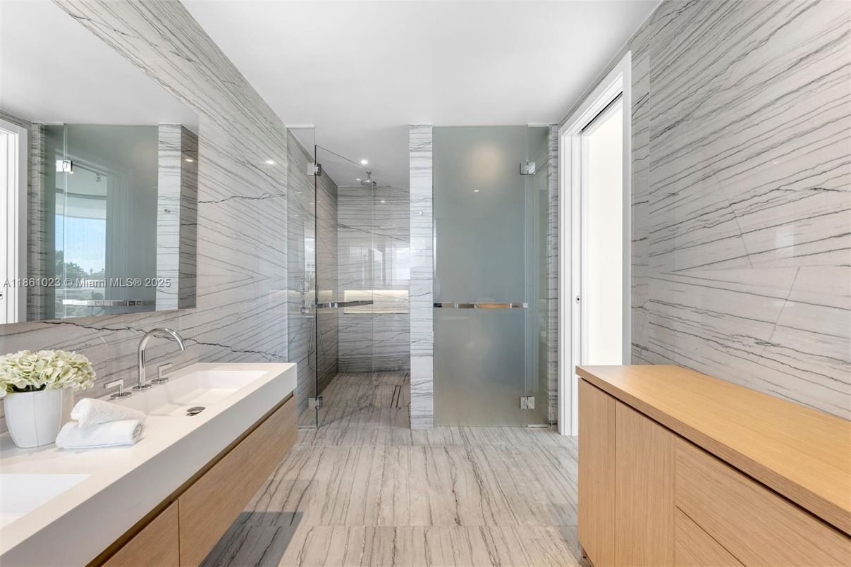 Bathroom, Dual Sink Vanities, Glass Shower, Interior, Marble, Marble Walls, Recessed Lighting