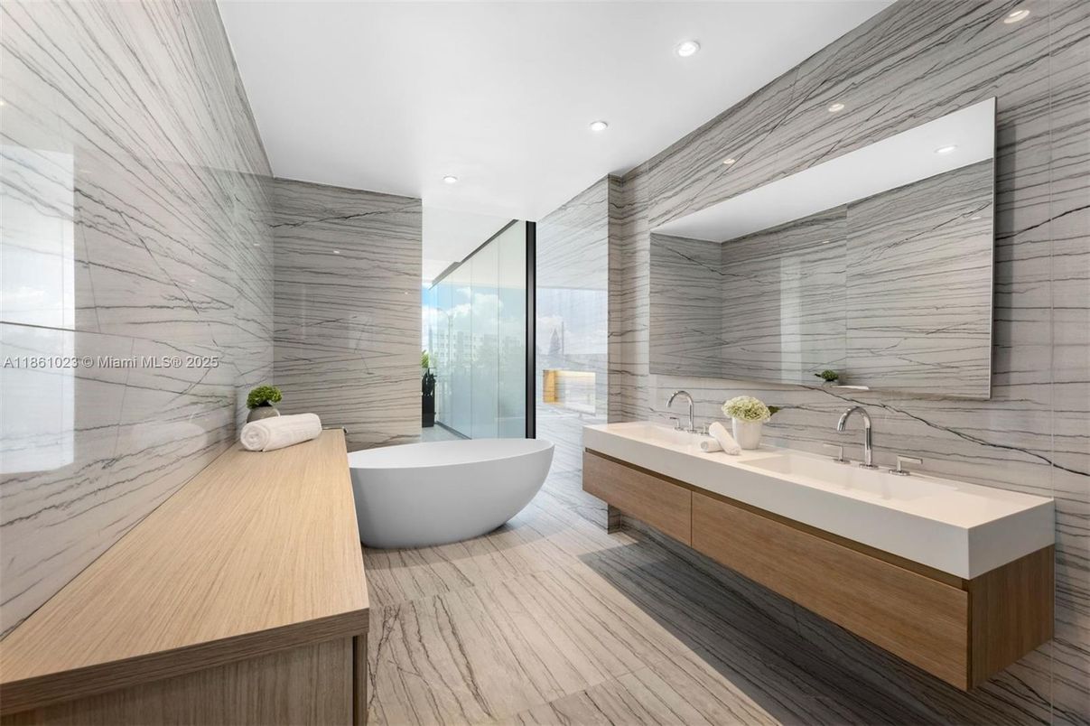 Bathroom, Dual Sink Vanities, Free Standing Baths, Glass Shower, Interior, Marble, Marble Walls, Recessed Lighting