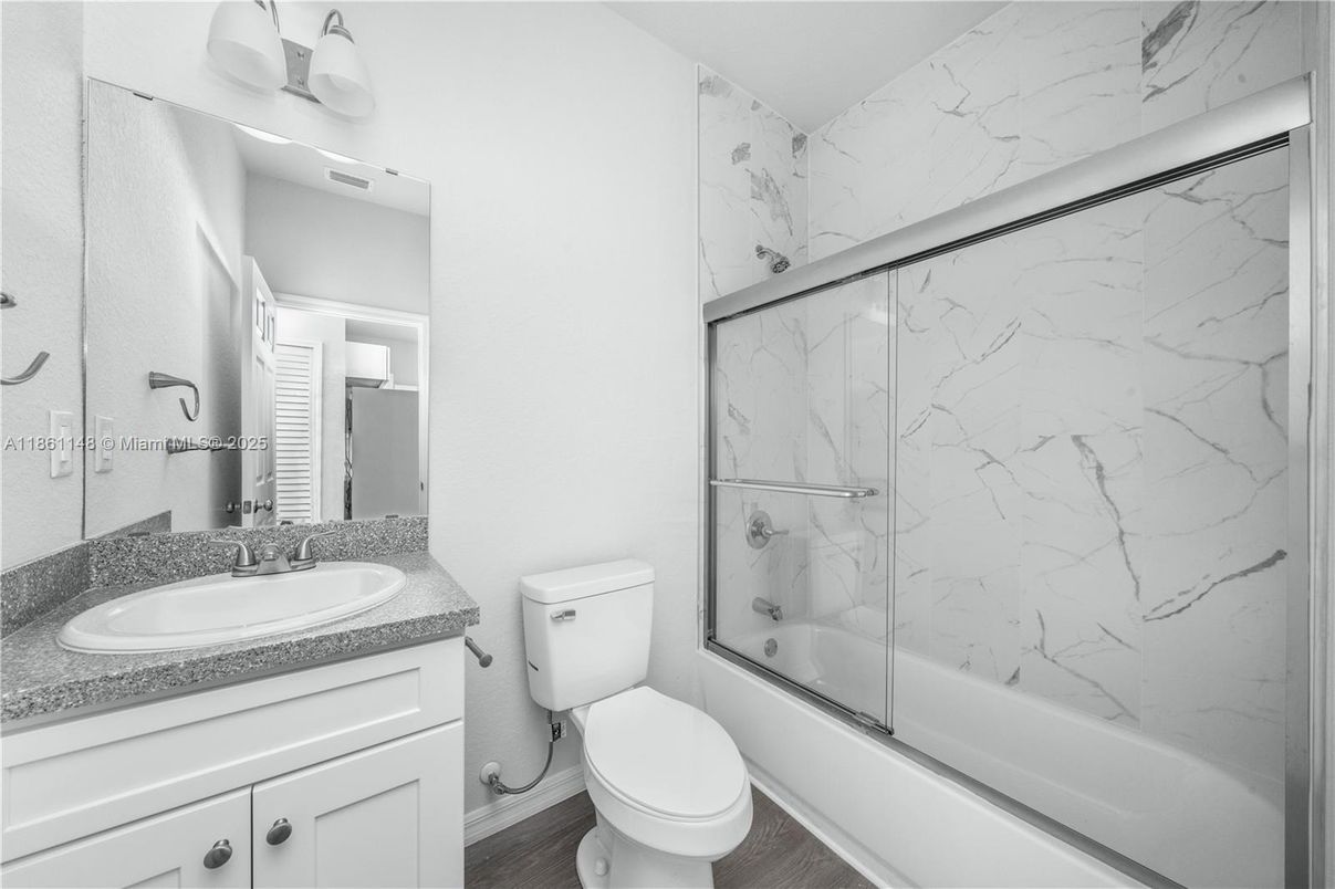 Bathroom, Glass Shower, Interior, Marble Walls, Wood Texture Flooring